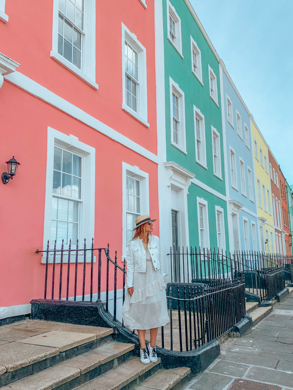 girl and colorful houses